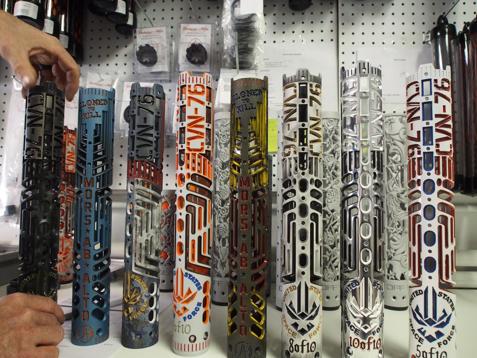 A series of Space Force-themed hand guards at Unique ARs, an Idaho company that specializes in custom AR rifles. An estimated 16 million AR rifles are in civilian hands in America. CREDIT: HEATH DRUZIN/BOISE STATE PUBLIC RADIO