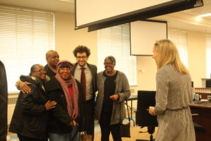 Alana Ervin, left, poses with family members and lawyer Spencer Gheen for a celebratory photo after the state clemency board recommends early release for family member Prenters Broughton, who awaits final approval from Gov. Jay Inslee. CREDIT: MAX WASSERMAN