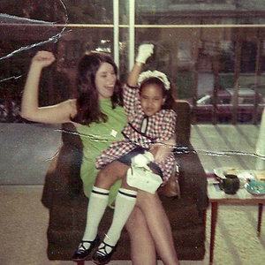 Jean Soliz and Miriam Pratt raise fists a few months after Edwin Pratt's assassination in 1969. Inspired by Edwin and his wife Bettye, who had been a social worker, Jean went on to have a career in social services. Courtesy of Jean Soliz