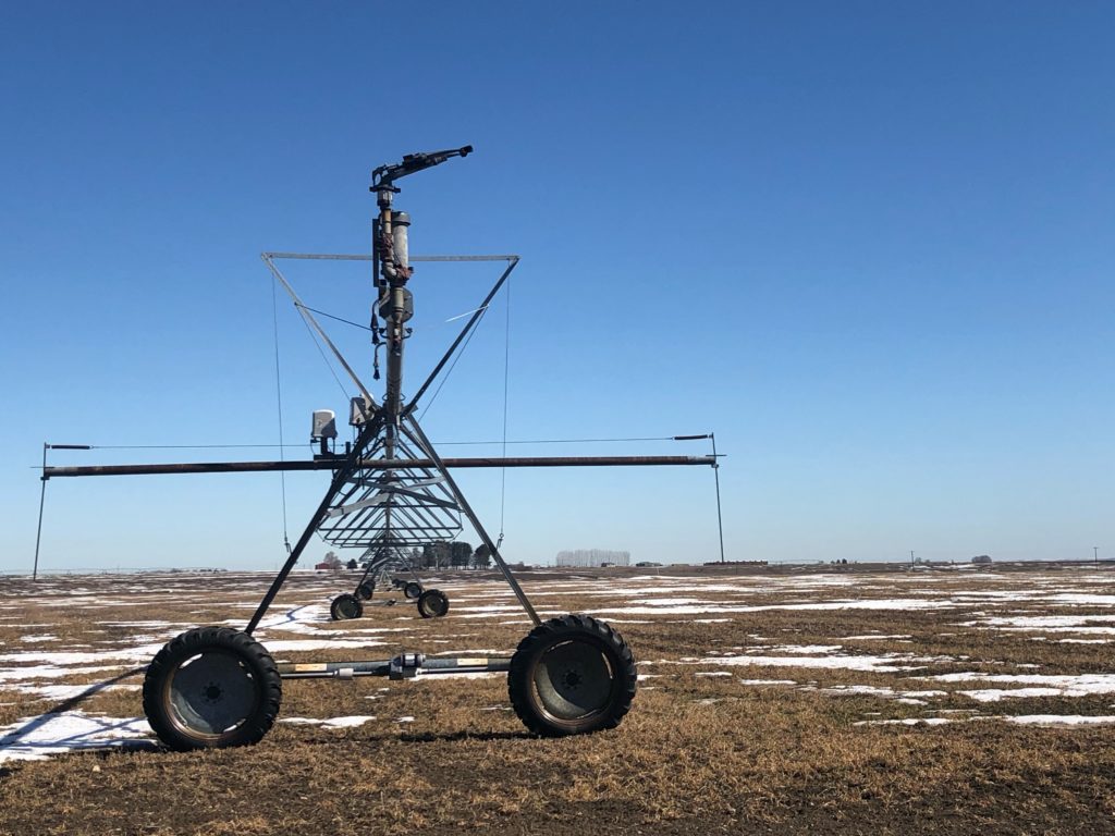 A irrigation pivot and field stands still on a spring day outside of Moses Lake. Potato farmers who grow as much as 70 percent of the nation’s French fries and processed potatoes are four weeks late in planting this year due to record winter weather. CREDIT: ANNA KING/N3