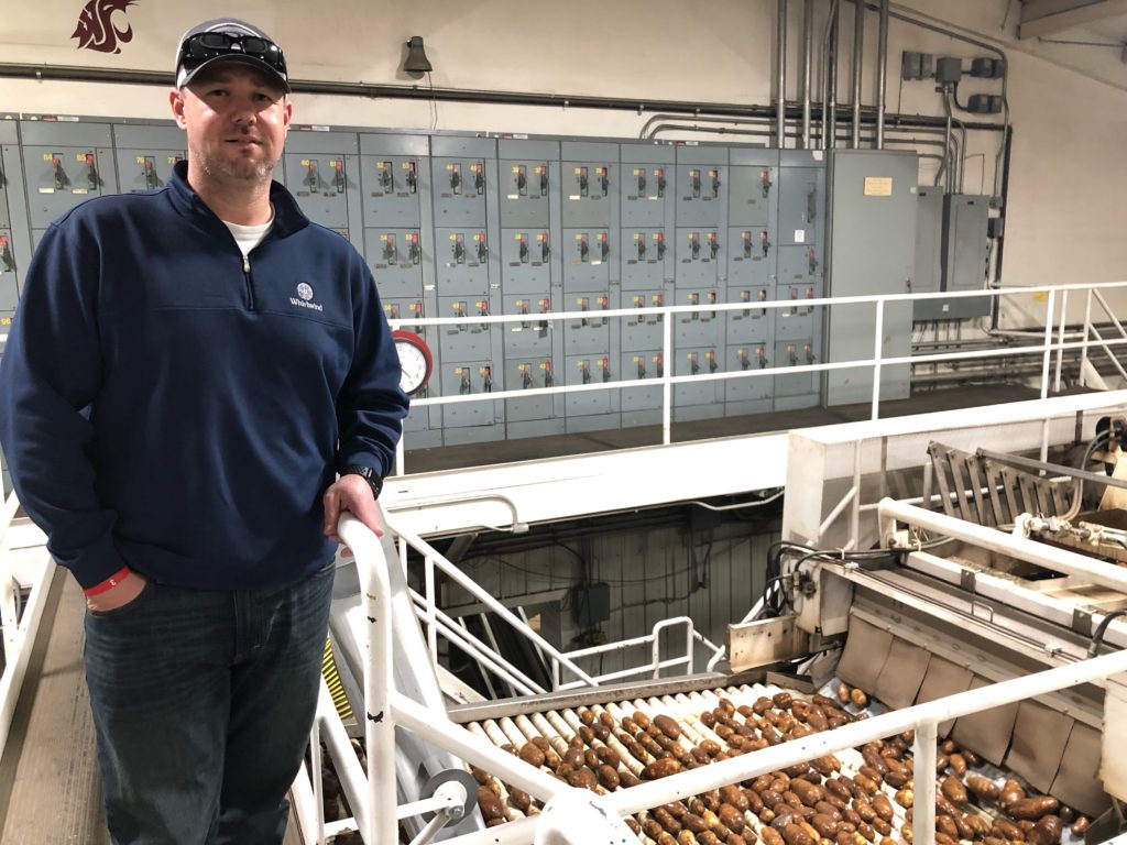 Jared Balcom, 45, is a fourth-generation potato farmer and packer in Pasco, Wash. He’s hoping a warm spring will help catch their crops up so they can meet their yields and set contracts with processing plants and fresh potato customers. CREDIT: ANNA KING/N3