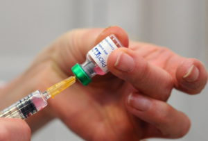 An MMR vaccination, immunizing against measles, mumps and rubella, is seen in the Health and Prevention Centre in Lyon, France. BSIP/UIG via Getty Images