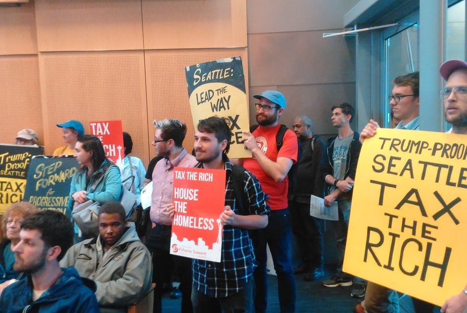 People pack Seattle City Hall in June 2017 for a meeting about whether to enact an income tax. CREDIT: KATE WALTERS/KUOW