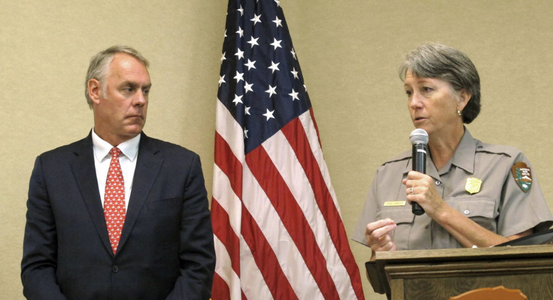 Grand Canyon National Park Superintendent Christine Lehnertz, seen in 2017 with then-Interior Secretary Ryan Zinke, was recently cleared of allegations of workplace harassment. Felicia Fonseca/AP