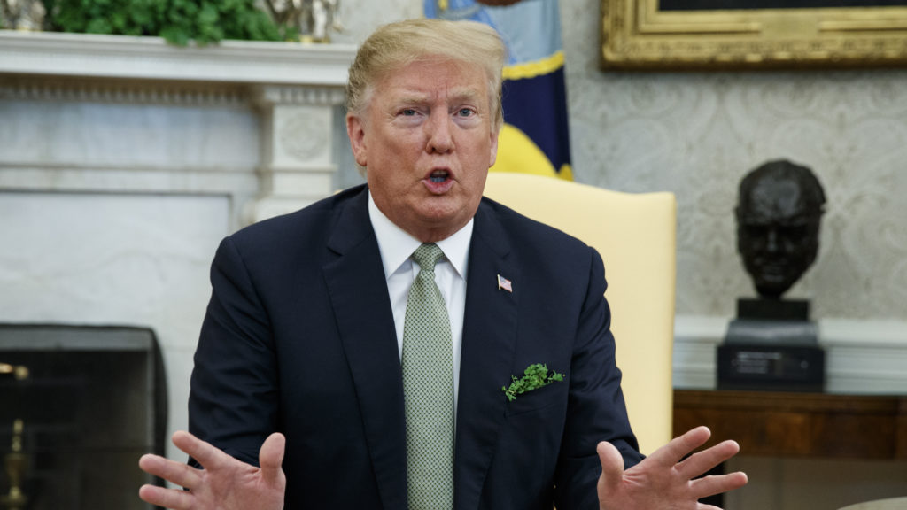 President Trump said Thursday he would "probably have to veto" the resolution blocking his emergency declaration to build a wall on the U.S.-Mexico border. CREDIT: Evan Vucci/AP
