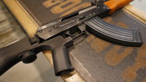 Bump stocks like this one installed on an AK-47 are now illegal in the U.S., after the Trump administration changed how they are legally defined. The devices can allow a semi-automatic rifle to fire nearly as fast as a machine gun. George Frey/Getty Images