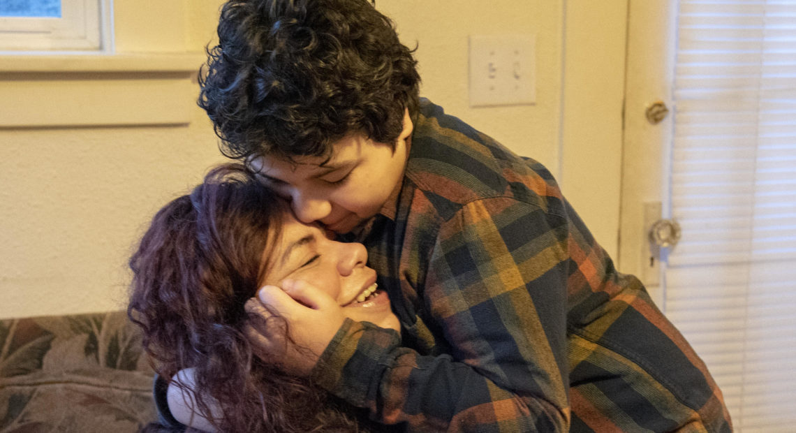 Carolina Landa hugs her son, Zach, in their living room before he leaves for school on Monday, Feb. 25, 2019. The two have been living together in the same home in Olympia since 2015. CREDIT: SHAUNA SOWERSBY / THE TACOMA NEWS TRIBUNE