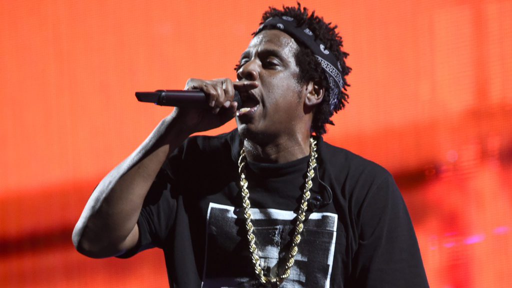 Jay-Z performs on stage during 'On the Run II' tour in 2018. The rapper is among the headliners of Woodstock 50. Kevin Mazur/Getty Images