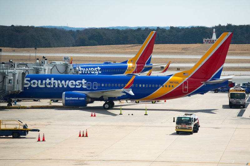A Boeing 737 Max 8 flown by Southwest Airlines sits at the gate at Baltimore Washington International Airport on Wednesday. "The grounding will remain in effect pending further investigation, including examination of information from the aircraft's flight data recorders and cockpit voice recorders," the FAA said in a statement. CREDIT: JIM WATSON/AFP/GETTY IMAGES