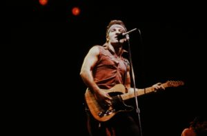 Bruce Springsteen onstage during the Born in the U.S.A. Tour in 1984. CREDIT: Shinko Music/Getty Images