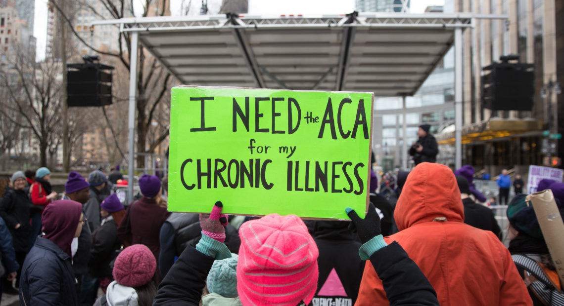 The Justice Department sent a letter in support of repealing the entirety of the Affordable Care Act. Here, a sign in support of the ACA in April 2017 in New York City. Kevin Hagen/Getty Images