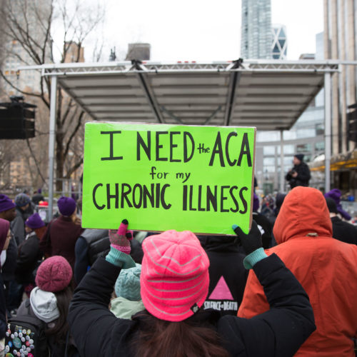 The Justice Department sent a letter in support of repealing the entirety of the Affordable Care Act. Here, a sign in support of the ACA in April 2017 in New York City. Kevin Hagen/Getty Images