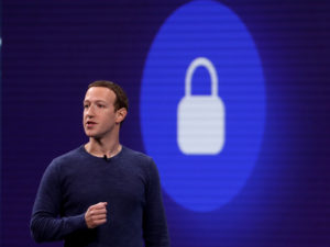 Facebook CEO Mark Zuckerberg speaks during the F8 Facebook Developers conference on May 1, 2018, in San Jose, Calif. He is pledging more enhanced privacy and other features when it comes to private messages. Justin Sullivan/Getty Images