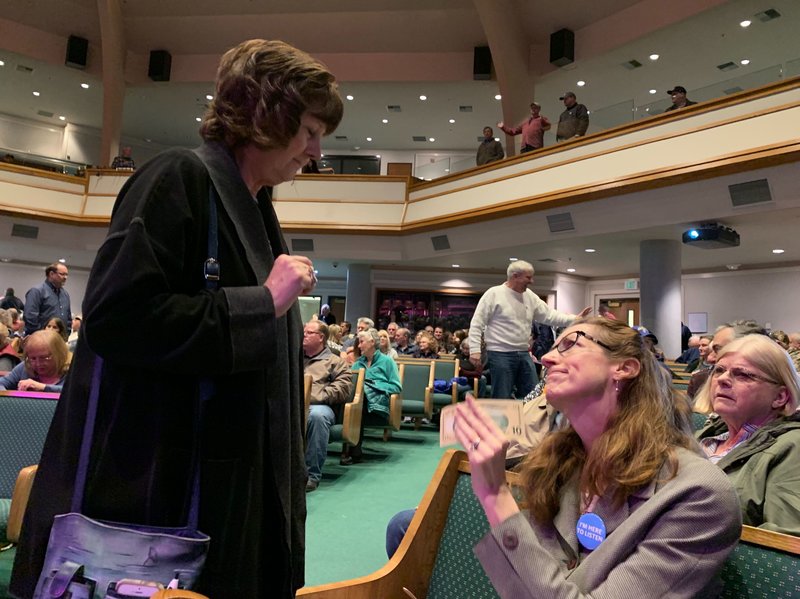 Paradise Mayor Jody Jones talks with anxious constituents about rebuilding their town, destroyed in last fall's Camp Fire, at a recent town hall meeting at Paradise Alliance Church. CREDIT: KIRK SIEGLER/NPR