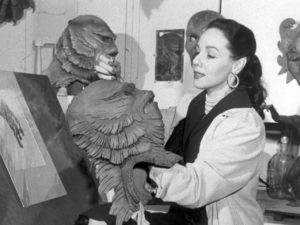 Milicent Patrick poses in the Universal Studios monster shop with her most famous creation: the Creature from the Black Lagoon. Family collection/Courtesy of Hanover Square Press