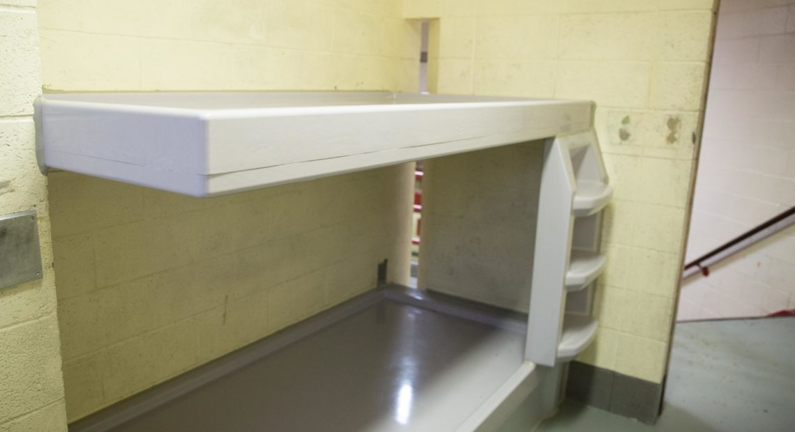 A molded-plastic bunk in a maximum security cell at the Clark County Jail in Vancouver, Washington, on March 14, 2019. The molded-form of the bunk makes it impossible to tie things like bedsheets to the bunk. CREDIT: Bryan M. Vance/OPB