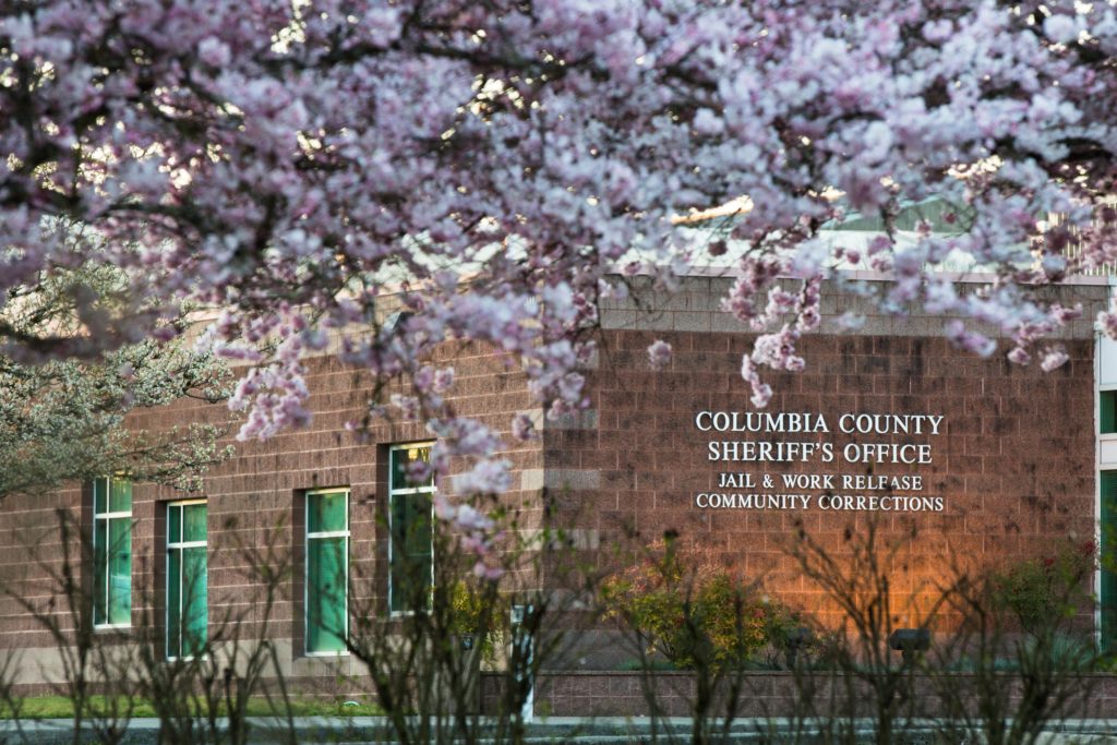 The Columbia County Jail is pictured Saturday, March 30, 2019, in St. Helens, Ore. In 2016, two Columbia County inmates attempted suicide on the same day. Deputies revived one, but 44-year-old Jason Shaw later died at a Portland hospital. He had hanged himself using a bed sheet. CREDIT: Bradley Parks/OPB.