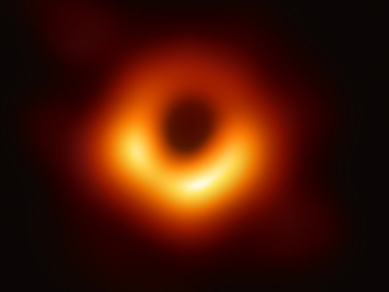 The first-ever image of a black hole was released Wednesday by a consortium of researchers, showing the "black hole at the center of galaxy M87, outlined by emission from hot gas swirling around it under the influence of strong gravity near its event horizon." CREDIT: Event Horizon Telescope collaboration et al