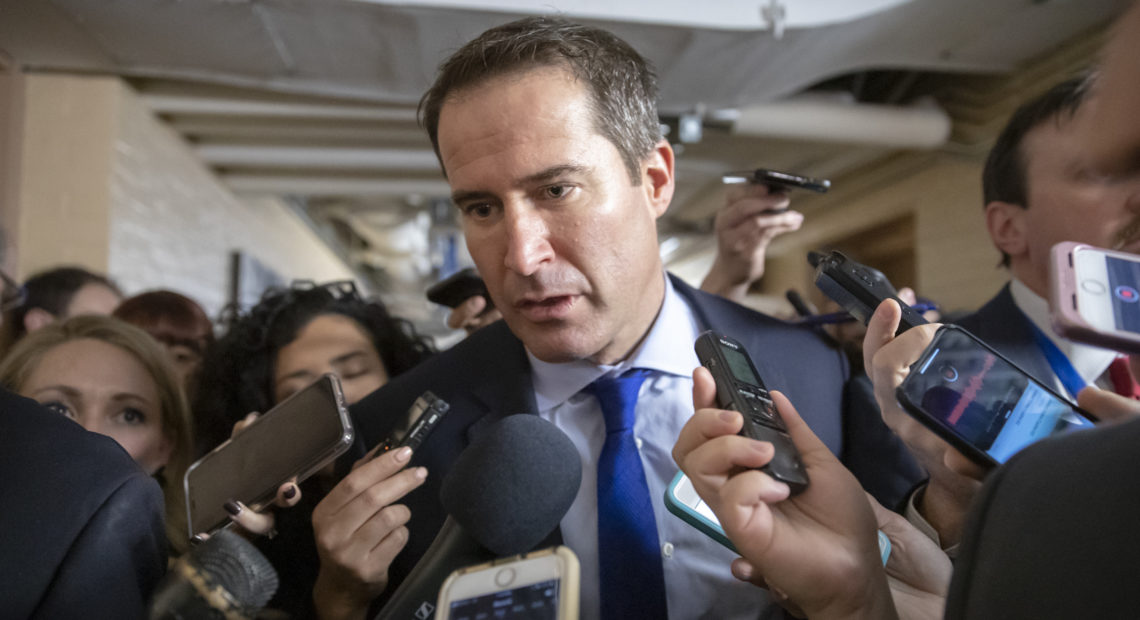 Rep. Seth Moulton, D-Mass., seen being questioned by reporters on Capitol Hill last year, is joining the large field of Democratic presidential candidates. J. Scott Applewhite/AP