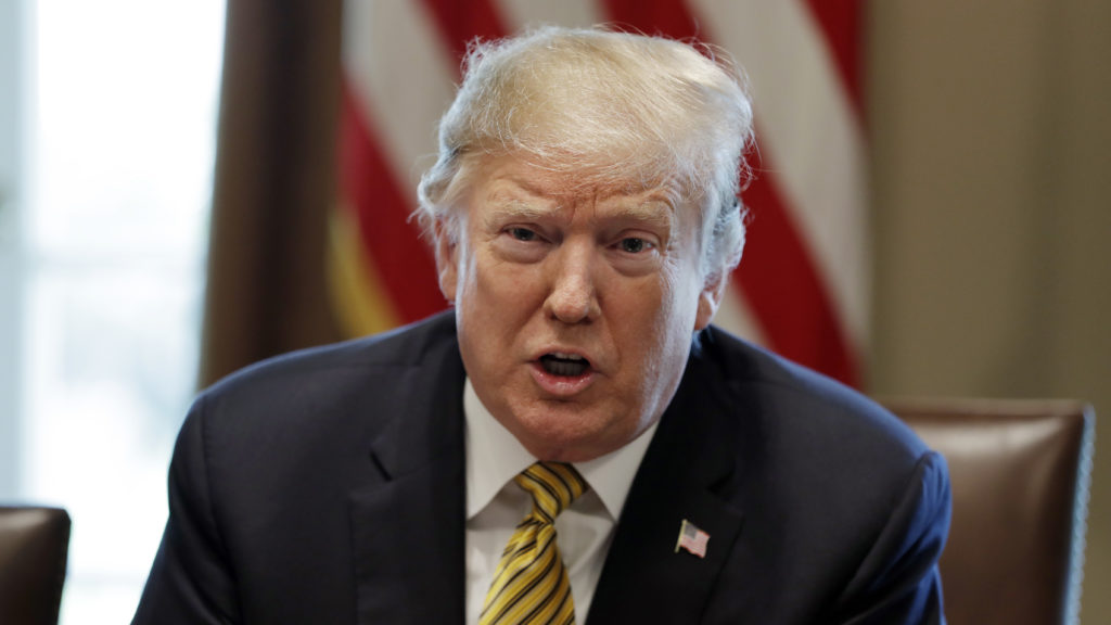 President Trump said Thursday that he was giving Mexico one year to stem the flow of migrants and drugs coming across the Southern border, or else the U.S. would impose auto tariffs or close the border. Evan Vucci/AP