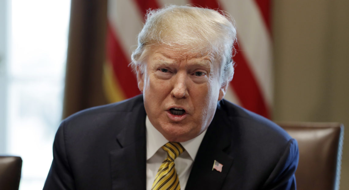 President Trump said Thursday that he was giving Mexico one year to stem the flow of migrants and drugs coming across the Southern border, or else the U.S. would impose auto tariffs or close the border. Evan Vucci/AP