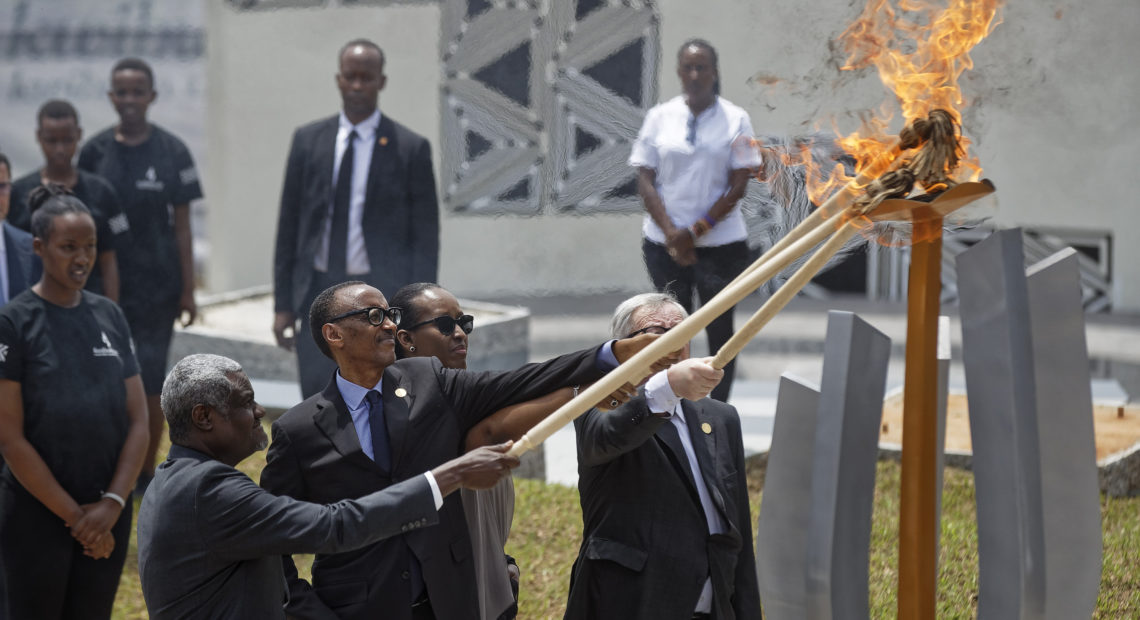 From left to right, Chairperson of the African Union Commission Moussa Faki Mahamat, Rwandan President Paul Kagame, Rwandan First Lady Jeannette Kagame, and President of the European Commission Jean-Claude Juncker, light the flame of remembrance at the Kigali Genocide Memorial in Kigali, Rwanda on Sunday. Ben Curtis/AP