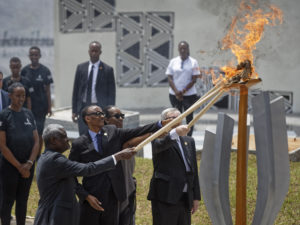 From left to right, Chairperson of the African Union Commission Moussa Faki Mahamat, Rwandan President Paul Kagame, Rwandan First Lady Jeannette Kagame, and President of the European Commission Jean-Claude Juncker, light the flame of remembrance at the Kigali Genocide Memorial in Kigali, Rwanda on Sunday. Ben Curtis/AP