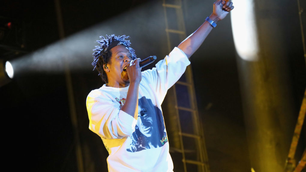 Jay-Z performs at the Something in the Water festival in Virginia Beach, Va., on Saturday. The rapper was one of the many artists who had been scheduled to perform at Woodstock 50. CREDIT: Brian Ach/Getty Images for Something in the Water