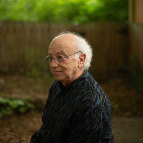 Rich Isaacson, seen in his backyard in Pentagon City, Va., wrote his thesis on gravitational waves and says he always thought their existence would be proved sometime during his career. But he didn't realize that trying to see them would become his career. CREDIT: Ryan Kellman/NPR