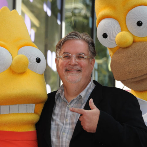 Cartoonist Matt Groening, creator of "The Simpsons," poses with his characters Bart (L) and Homer Simpson as he is honored with the 2,459th star on the Hollywood Walk of Fame February 14, 2012 in Hollywood, California. The 500th episode of the "The Simpsons" will air in the US on February 19th. CREDIT: Robyn Beck/AFP/Getty Images