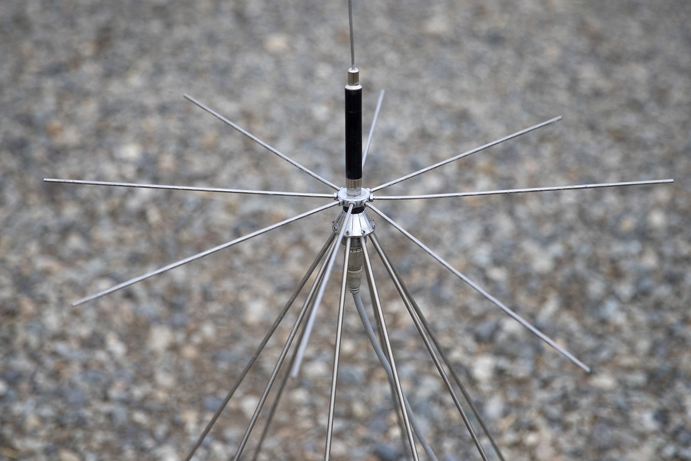 An antenna is shown in the driveway of Elise Walker's home on Monday, April 22, 2019, in Okanogan. Walker has three scanners playing in her home at all times to monitor fire calls. The calls that she is able to hear depend on where on her property her antenna is placed. CREDIT: KUOW PHOTO/MEGAN FARMER