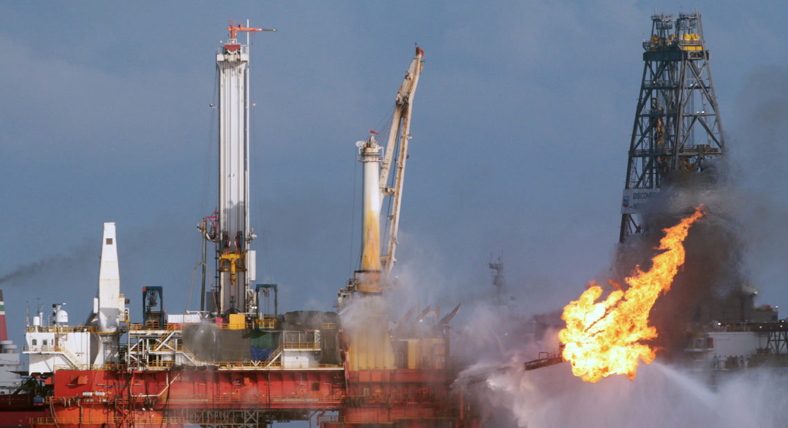 The Deepwater Horizon oil rig is seen here in July 2010, shortly before the Macondo well was capped after spilling oil for 87 days. The Trump administration has proposed revisions to Obama-era rules that aimed to prevent similar disasters. Dave Martin/Associated Press