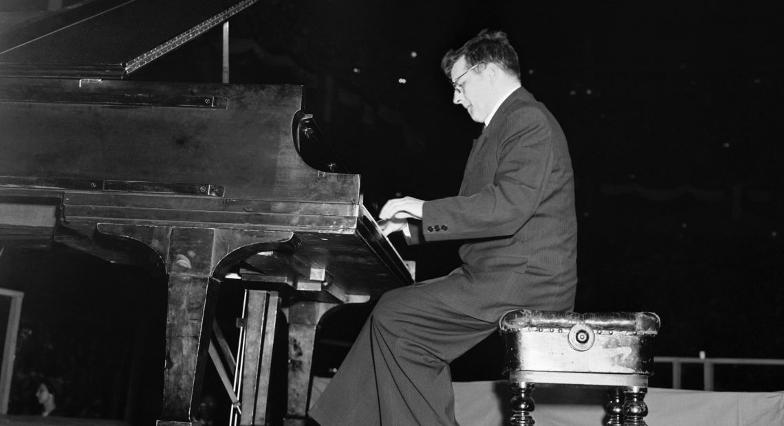 Dmitri Shostakovich, Russian composer-member of the Soviet delegation to the Cultural and Scientific conference for World Peace, plays the second movement of his Fifth Symphony at Madison Square Garden in New York City on March 27, 1949. Marty Lederhandler/AP