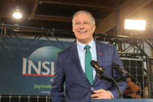 Washington Gov. Jay Inslee announces his run for the 2020 presidency at A&R Solar on March 1 in Seattle. He says tackling climate change should be "Job 1" for the next president. CREDIT: Karen Ducey/Getty Images