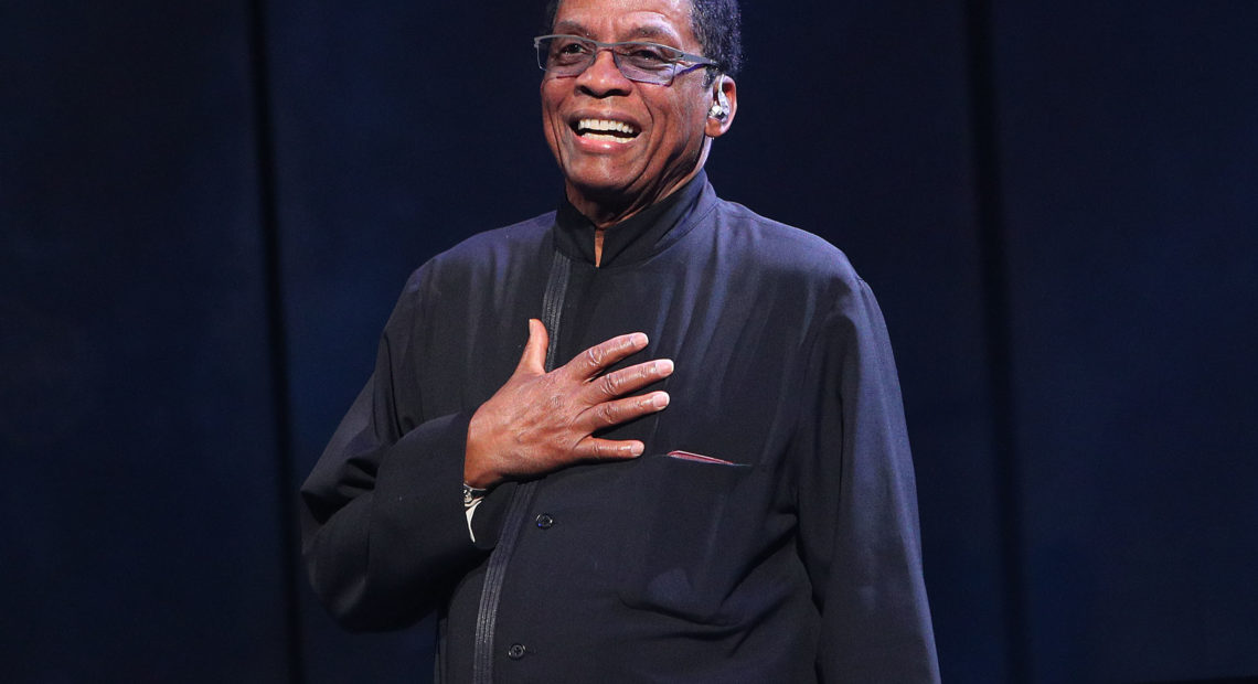 "It's about more than being American, or Australian, or any particular group. But it celebrates the cultures of all the groups. This is what jazz really does," Herbie Hancock tells NPR. Here, Hancoock is pictured onstage during the International Jazz Day 2019 All-Star Global Concert. Graham Denholm/Getty Images for Herbie Hancock