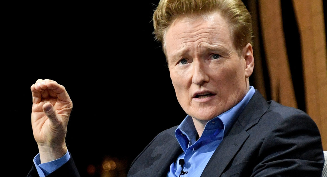 Late night TV host Conan O'Brien, pictured in 2016, has settled a lawsuit with a man who accused O'Brien and his writing staff of stealing his jokes. Mike Windle/Getty Images for Vanity Fair