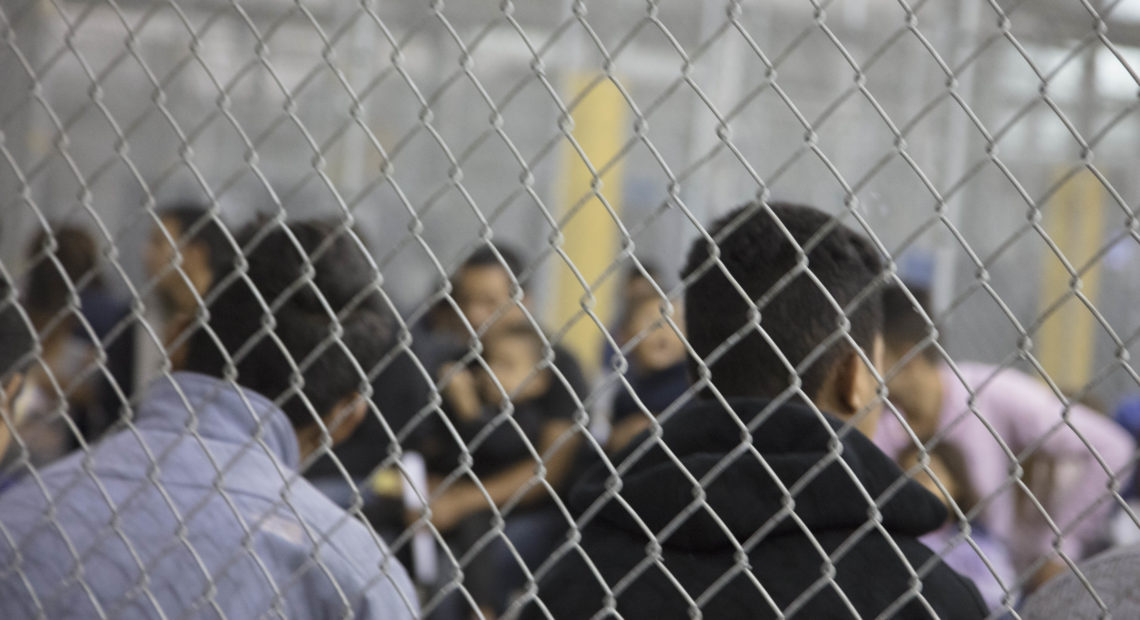 U.S. Border Patrol agents conduct intake at the Central Processing Center in McAllen, Texas. The center is temporarily not taking in migrants after the outbreak of "a flu-related illness." U.S. Customs And Border Protection/Getty Images