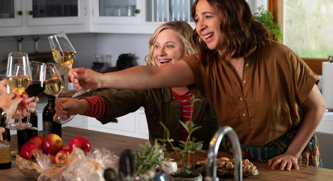 Abby (Amy Poehler) and Naomi (Maya Rudolph) share a toast in Wine Country. CREDIT: Colleen Hayes/Netflix