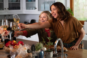 Abby (Amy Poehler) and Naomi (Maya Rudolph) share a toast in Wine Country. CREDIT: Colleen Hayes/Netflix