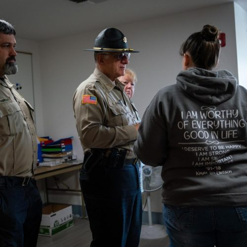 Coos County Sheriff Craig Zanni, center, speaks with Sheriff Department dispatchers on June 6, 2019, in Coquille, Ore. CREDIT: JONATHAN LEVINSON/OPB