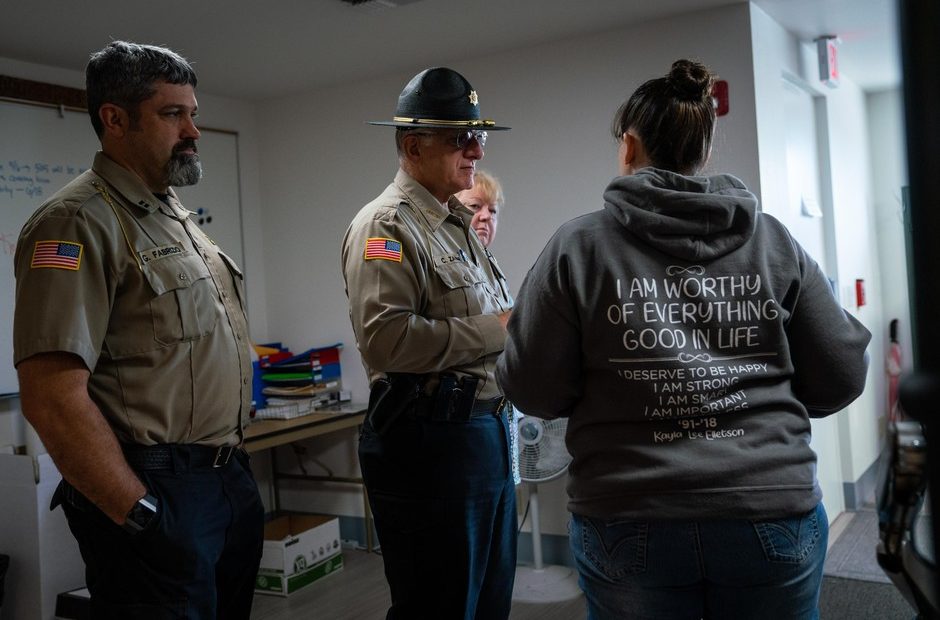 Coos County Sheriff Craig Zanni, center, speaks with Sheriff Department dispatchers on June 6, 2019, in Coquille, Ore. CREDIT: JONATHAN LEVINSON/OPB