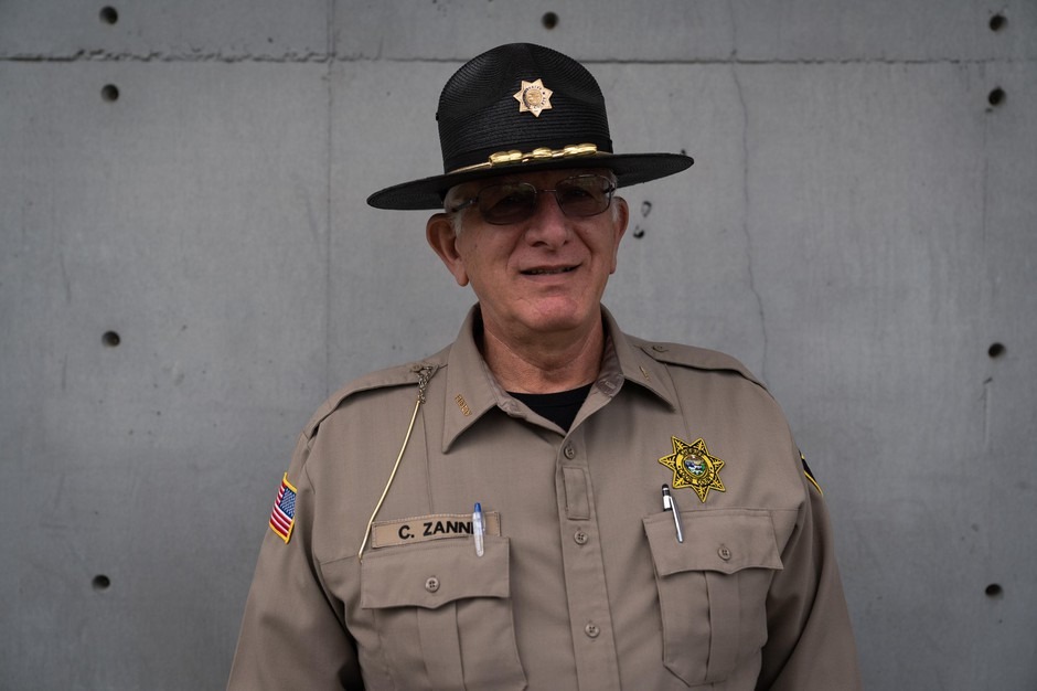 Coos County Sheriff Craig Zanni, center, speaks with Sheriff Department dispatchers on June 6, 2019, in Coquille, Ore. CREDIT: JONATHAN LEVINSON/OPB