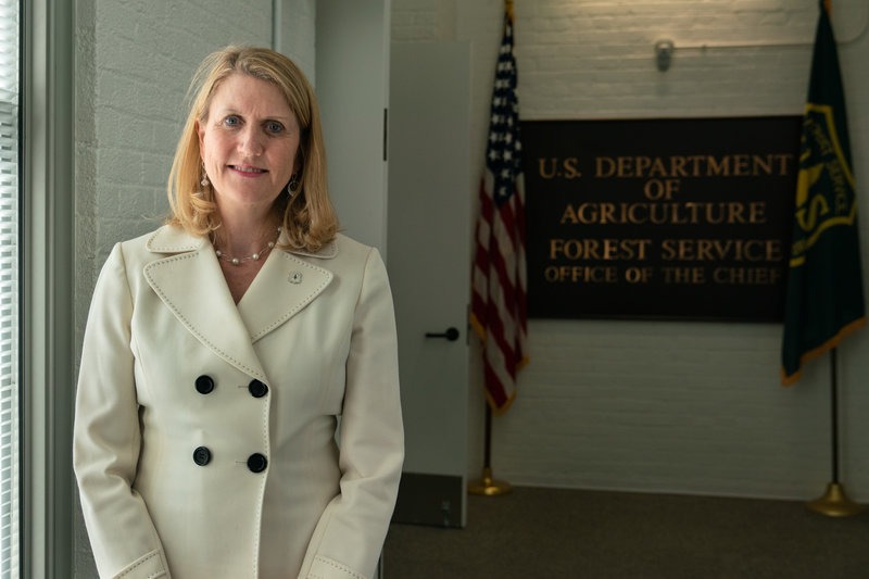 Vicki Christiansen, the chief of the U.S. Department of Agriculture's Forest Service, stands outside of her office in Washington, D.C. CREDIT: SHURAN HUANG/NPR