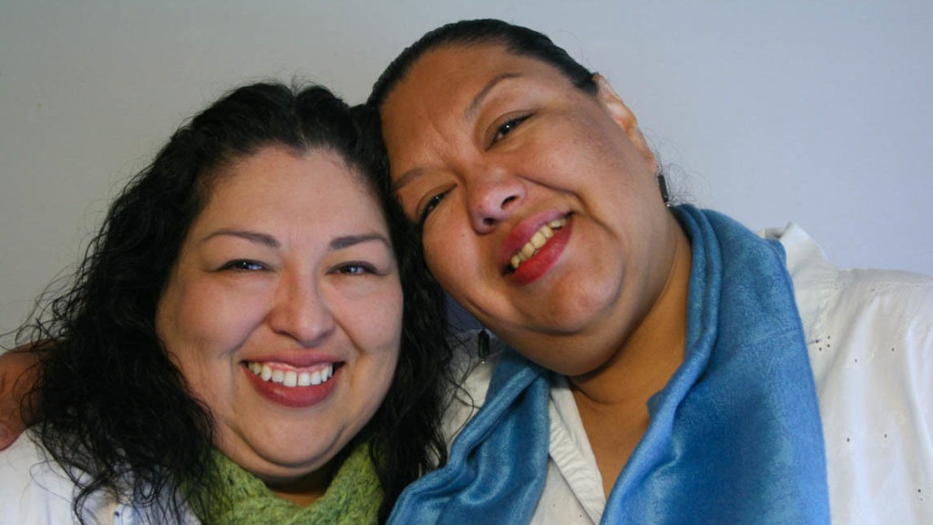 Candi and Estela Reyes shared memories of their father during a 2012 StoryCorps interview in El Paso, Texas. CREDIT: Anaid Reyes/StoryCorps