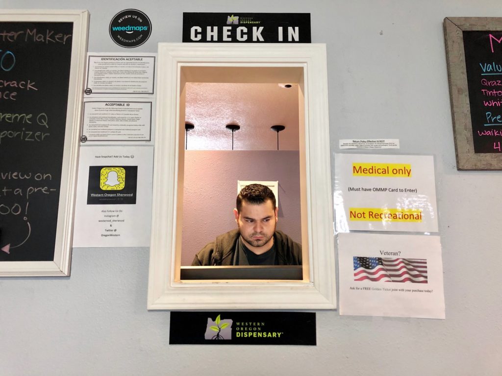 Roberto Gonzalez, the general manager of Western Oregon Dispensary in Sherwood, Ore., waits for customers. The dispensary is one of two medical-only marijuana dispensaries left in Oregon. An Associated Press analysis has found existing medical marijuana programs take a hit when states legalize cannabis for all adults. CREDIT: GILLIAN FLACCUS/AP