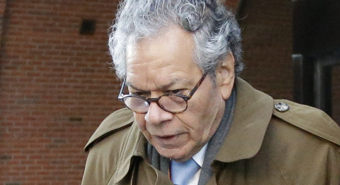Insys Therapeutics founder John Kapoor departs federal court in Boston, Jan. 30. On Monday the company filed for Chapter 11 bankruptcy, saying it needs to sell its assets to pay back creditors. Kapoor, who was convicted last month of racketeering, owns more than 63% of the company. Steven Senne/AP