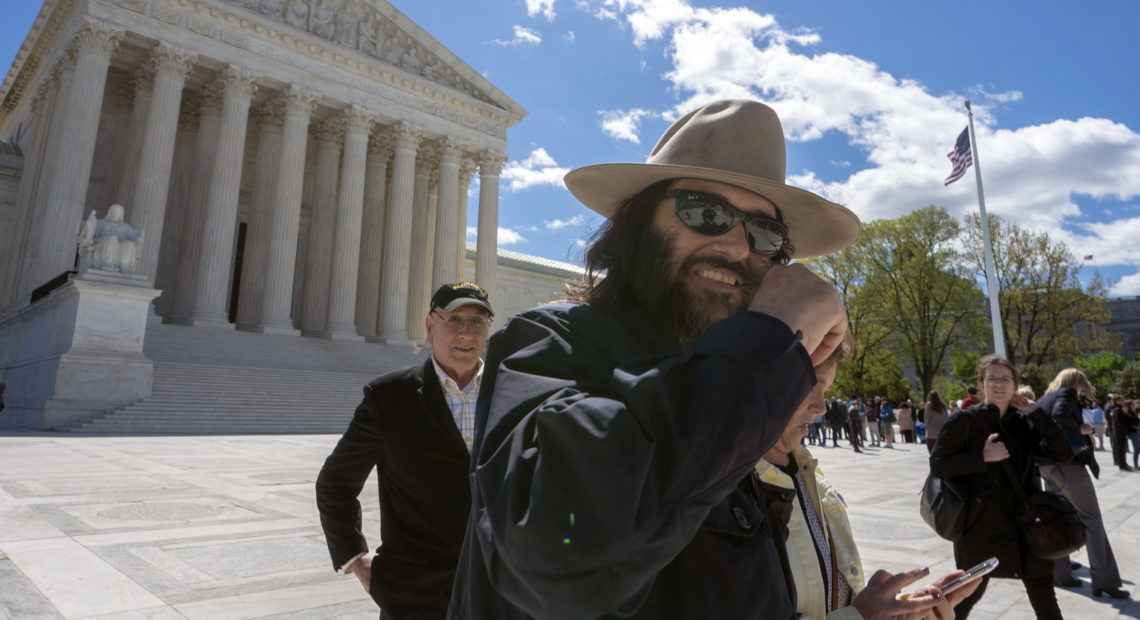 Los Angeles artist Erik Brunetti, the founder of the streetwear clothing company FUCT, leaves the Supreme Court after his trademark case was argued on April 15. CREDIT: J. Scott Applewhite/AP