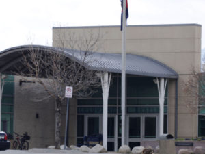 A proposal to demolish Columbine High School in response to a steady influx of visitors obsessed with the school's dark past has sparked a backlash among those who survived the tragedy. Joe Mahoney/AP