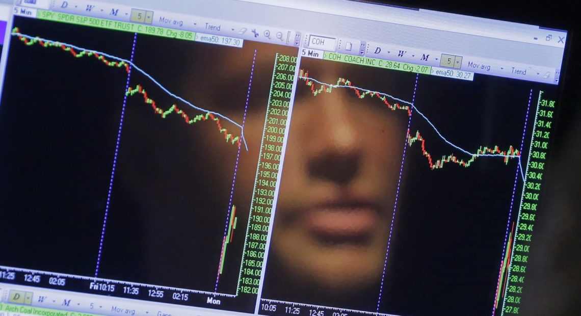 The floor of the New York Stock Exchange. An economic indicator known as the "yield curve inversion" hit the three-month mark, which has preceded the past 7 U.S. recessions. Richard Drew/AP