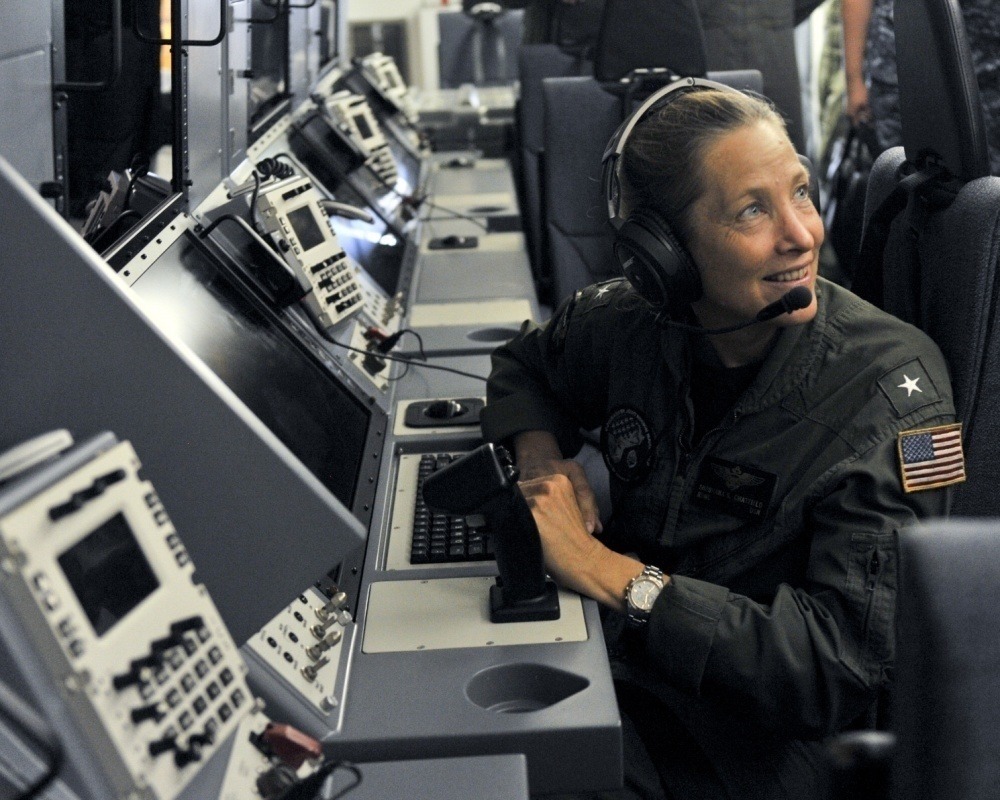 Rear Adm. Shoshana Chatfield sits at a mission crew work station in Guam. Chatfield has been named the next president of the Naval War College. Daniel Willoughby/U.S. Navy